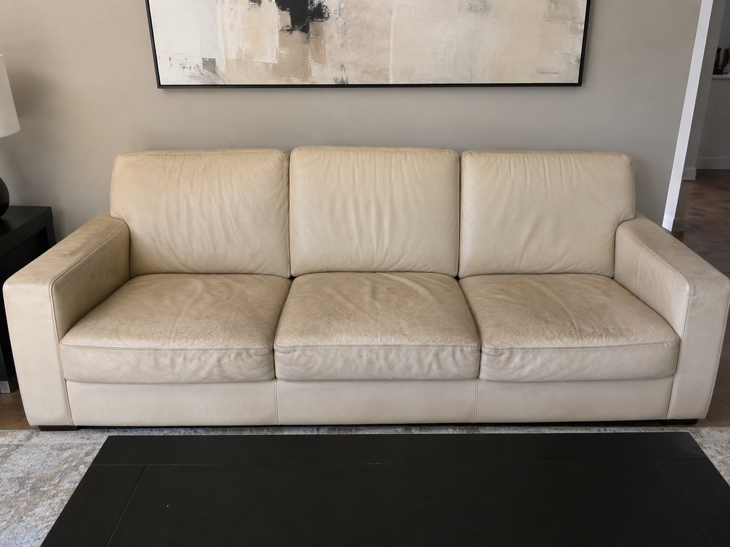 Soiled cream leather sofa before specialist cleaning